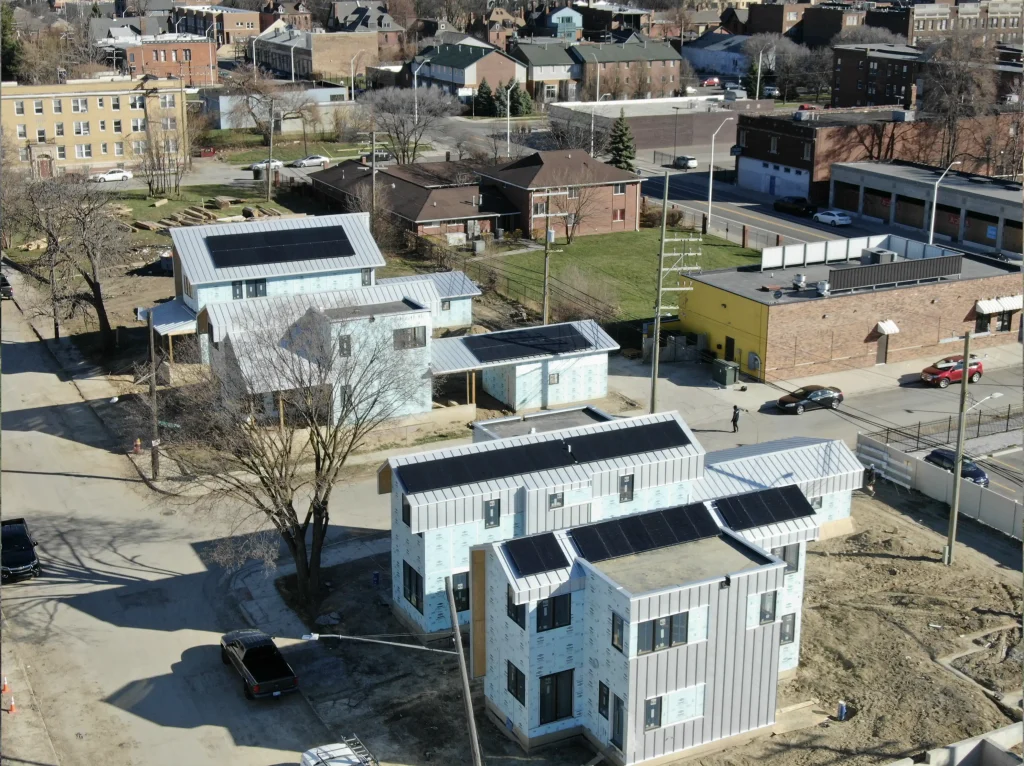 series of solar panels on city buildings